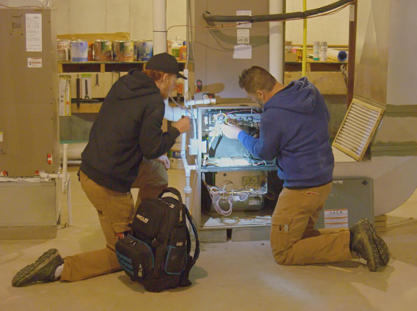 Licensed Plumb it Heat it Cool it technician completing boiler services